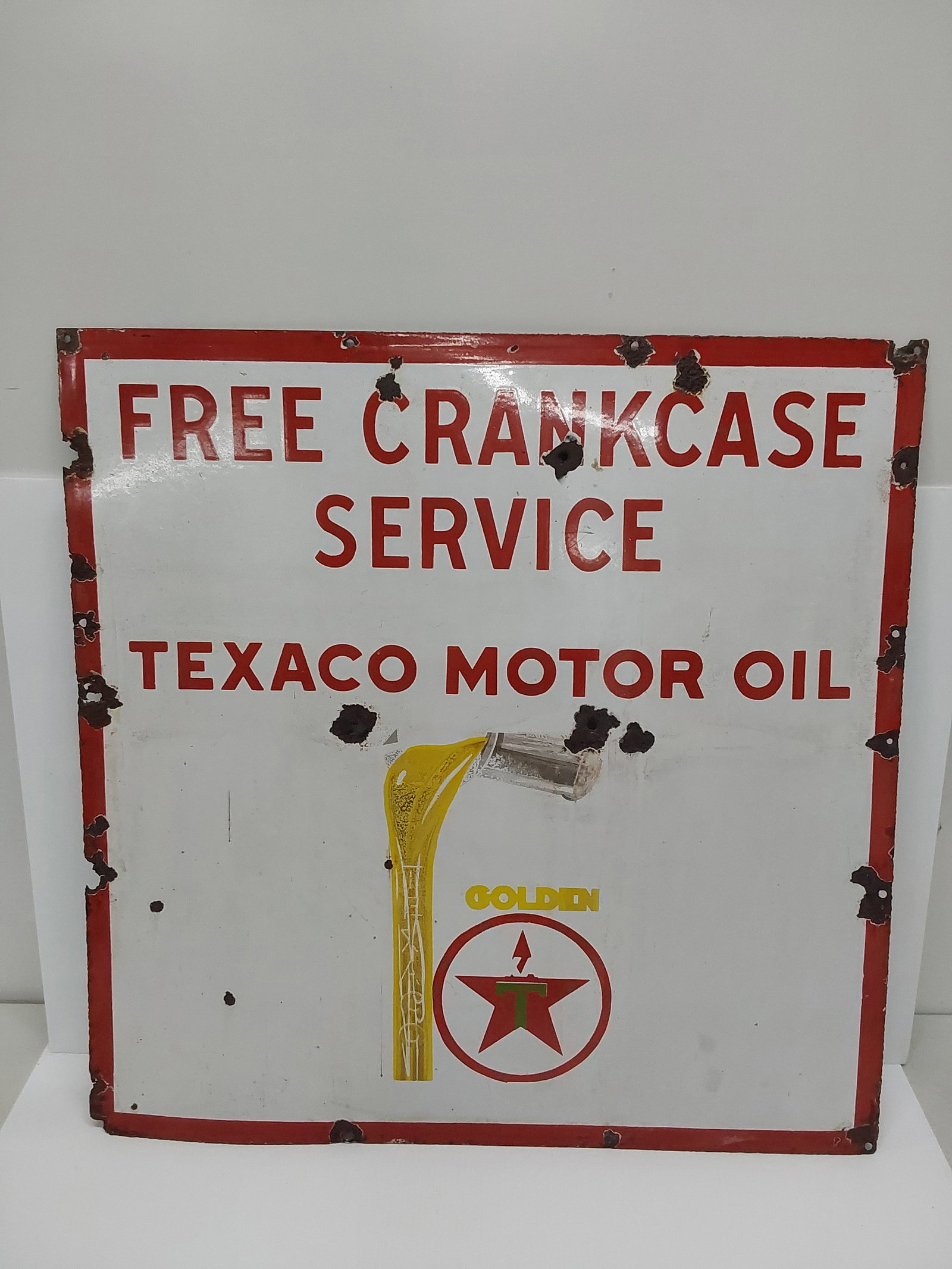 Free Crankcase Service Texaco SSP sign: Single Sided Porcelain "Free Crankcase Service Texaco Motor Oil" There are some extra holes. 30" x 30"