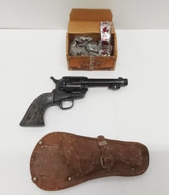flat with CO2 Crossman .22cal pistol w/accessories