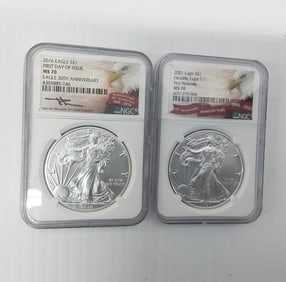(2) graded silver Eagles