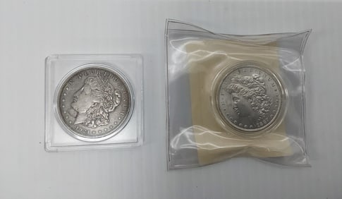 (2) Morgan silveer dollars