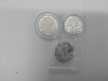 (3) silver Eagles