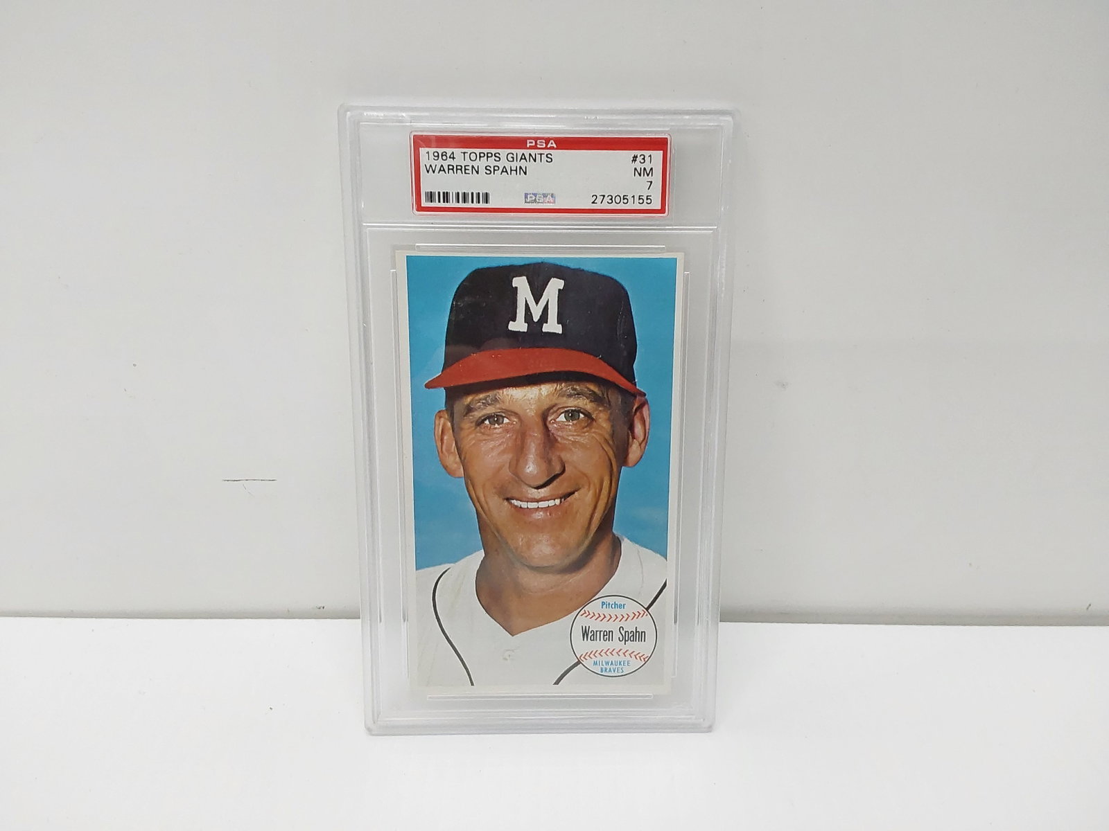 1964 Topps Giants #31 Warren Spahn graded card: PSA graded NM 7