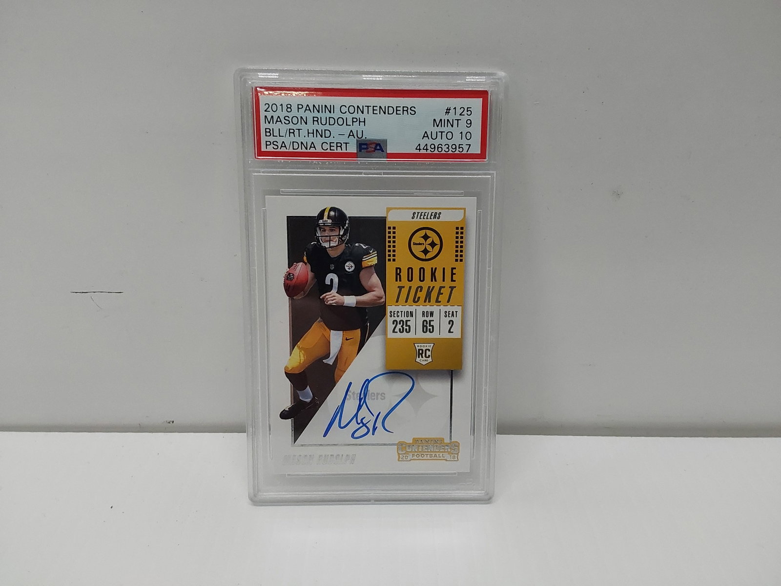 2018 Mason Rudolph #125 graded autographed card: Panini Contenders, BU/RT HND-AU, PSA/DNA certified autograph, Mint 9