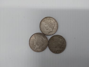 (3) Peace silver dollars