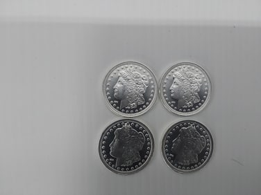 (4) 1 oz. silver rounds