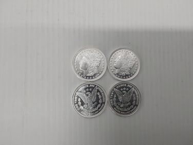 (4) 1 oz. silver rounds