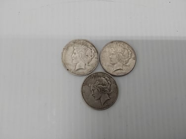 (3) Peace silver dollars