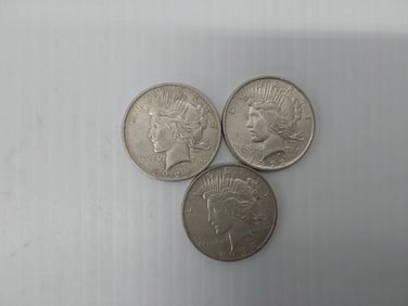 (3) Peace silver dollars