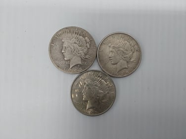 (3) Peace silver dollars