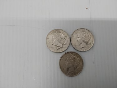 (3) Peace silver dollars