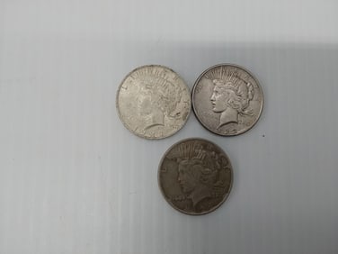(3) Peace silver dollars