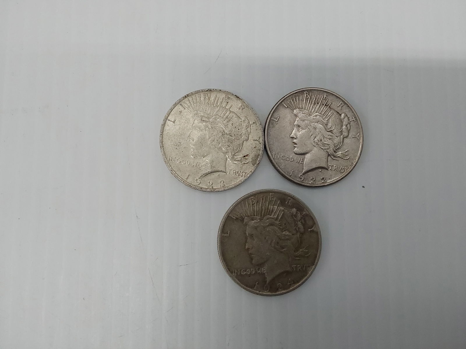 (3) Peace silver dollars (1 of 2)
