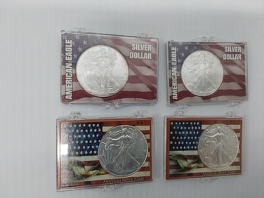 (4) silver Eagles in plastic