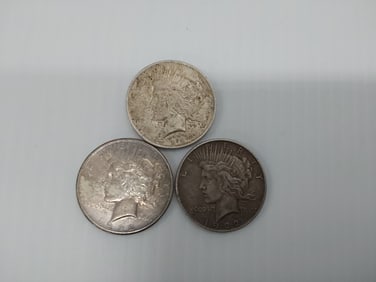 (3) Peace silver dollars