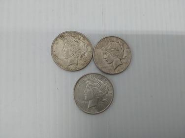 (3) Peace silver dollars