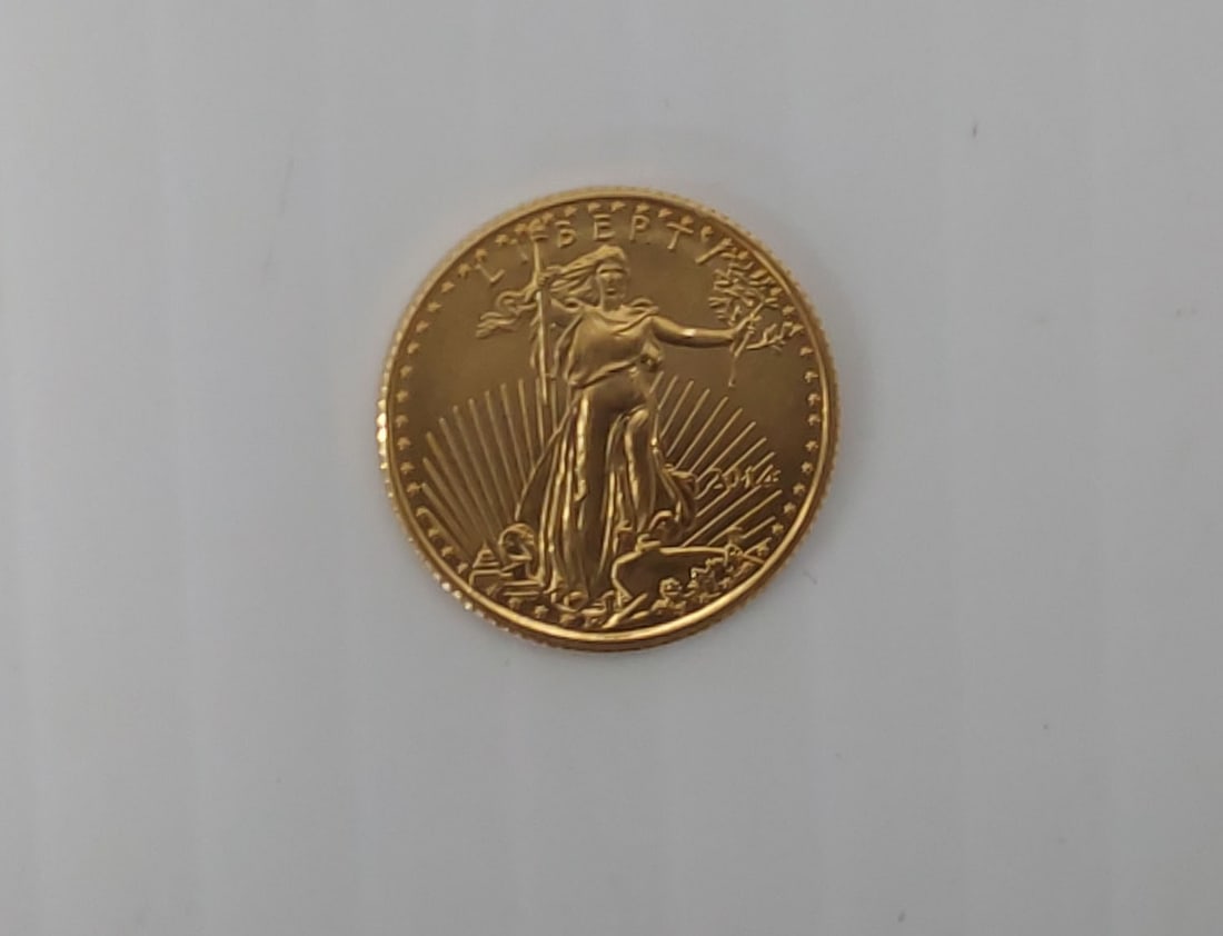 2014 1/10th oz fine gold $5 coin (1 of 2)