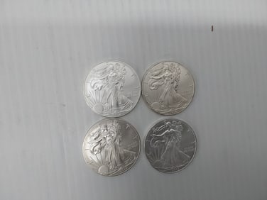 (4) 2012 silver Eagles