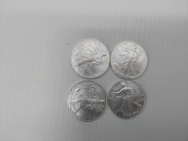 (4) 2004 silver Eagles