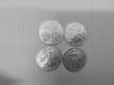 (4) 2004 silver Eagles