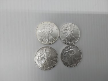(4) 2004 silver Eagles
