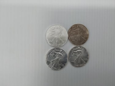 (4) silver Eagles