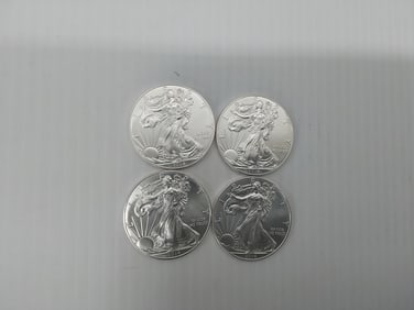 (4) 2014 silver Eagles