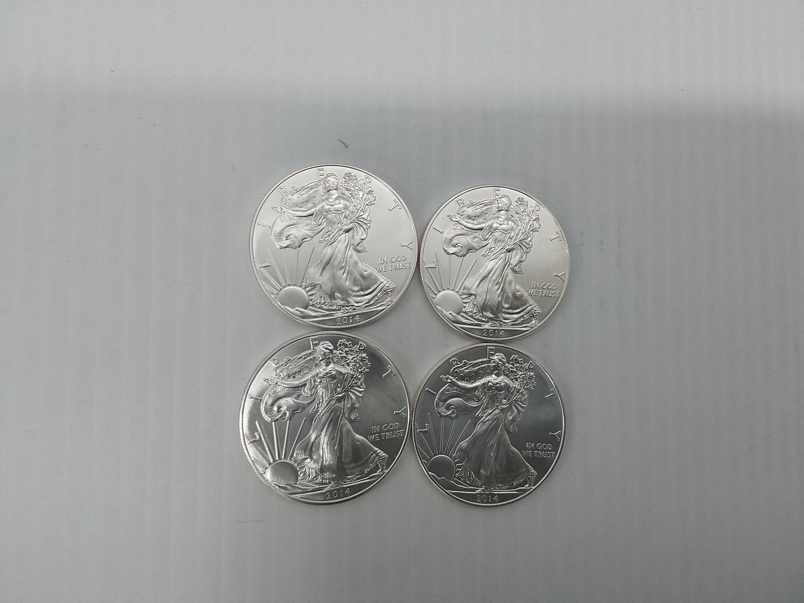 (4) 2014 silver Eagles (1 of 1)