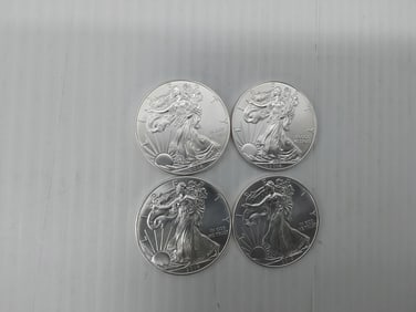 (4) 2014 silver Eagles