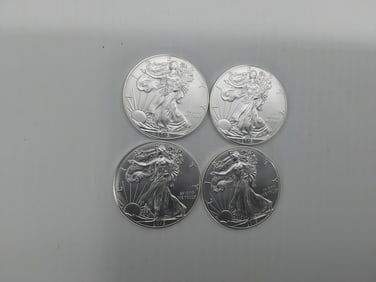 (4) 2015 silver Eagles