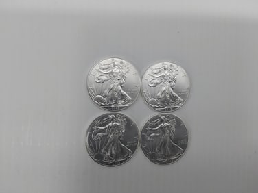 (4) 2015 silver Eagles