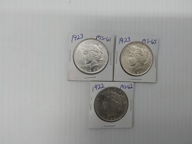 (3) Peace silver dollars