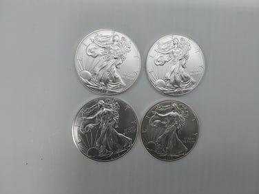 (4) 2015 silver Eagles