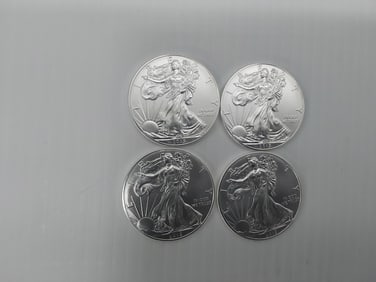 (4) 2015 silver Eagles