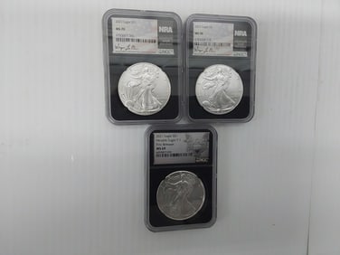 (3) graded and signed silver Eagles
