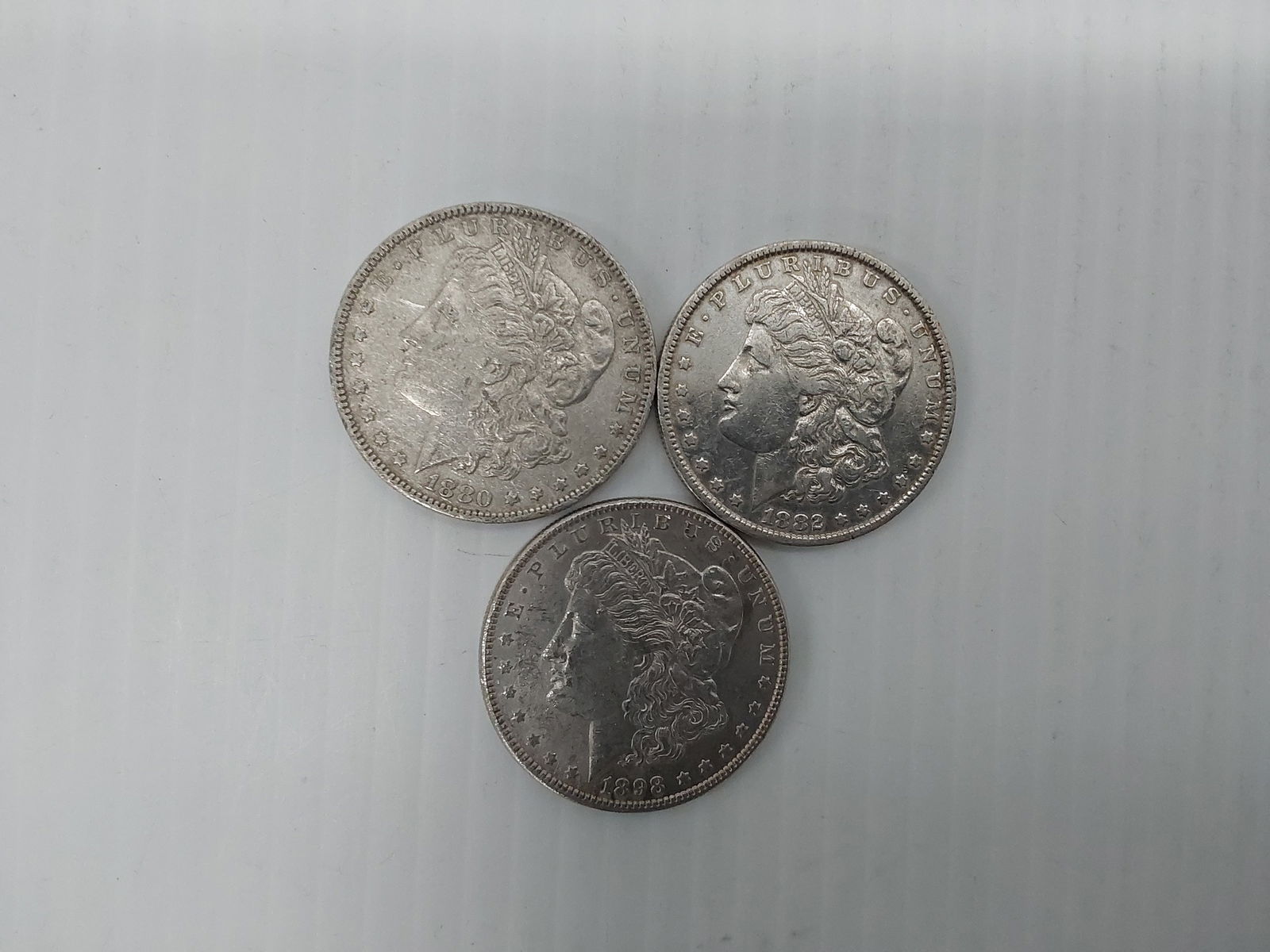 (3) Morgan silver dollars (1 of 2)