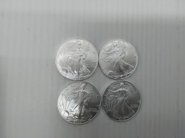(4) 2006 silver Eagles