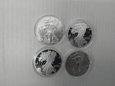 (4) silver Eagles
