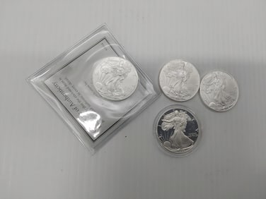 (4) silver Eagles