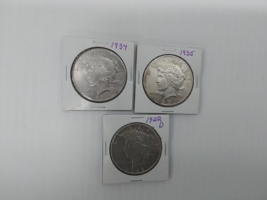 (3) Peace silver dollars