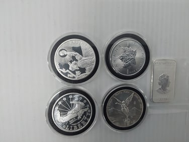 (4) misc 1 oz silver rounds and (1) silver bar