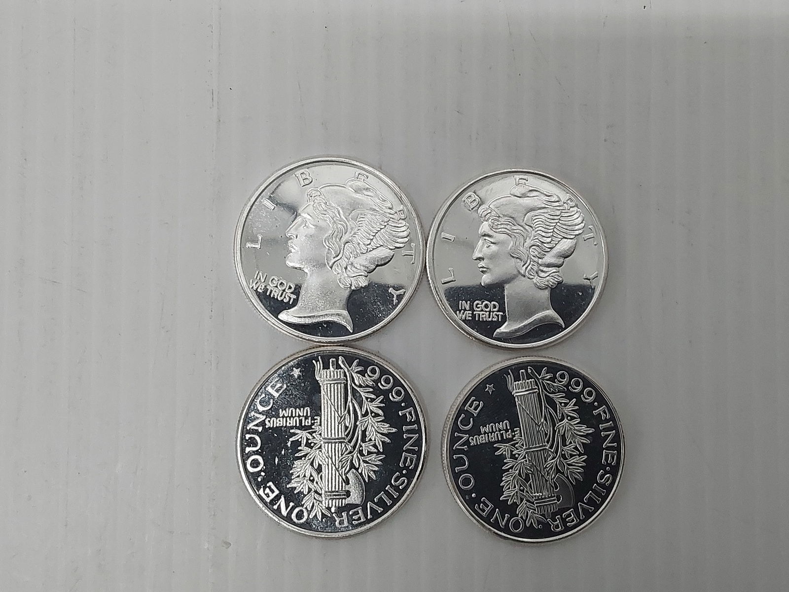 (4) 1 oz .999 silver rounds (1 of 1)
