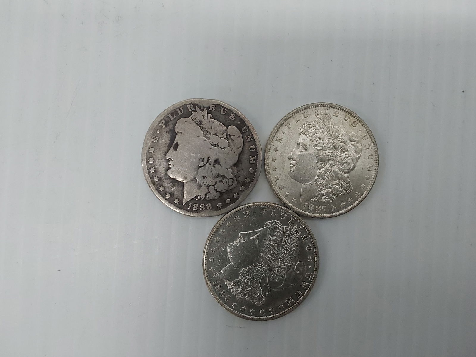 (3) Morgan silver dollars (1 of 2)