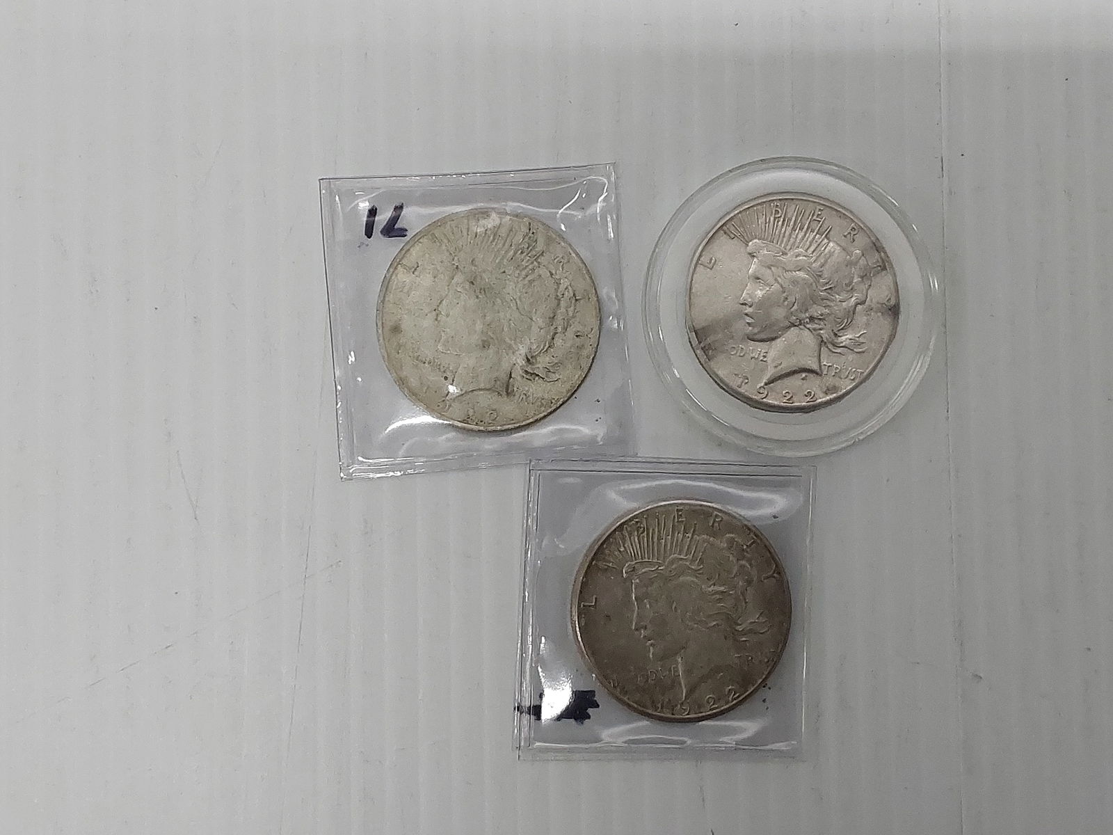 (3) Peace silver dollars (1 of 2)