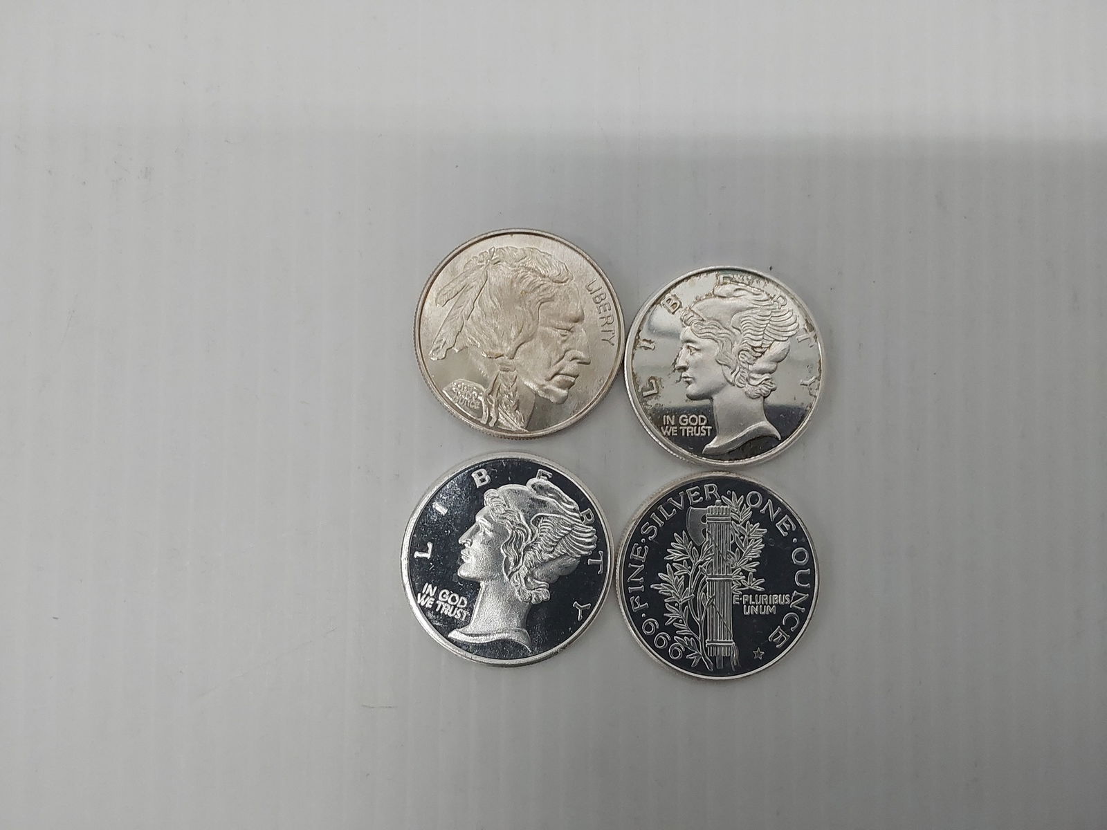 (4) miscellaneous 1 ozt .999 silver rounds (1 of 1)