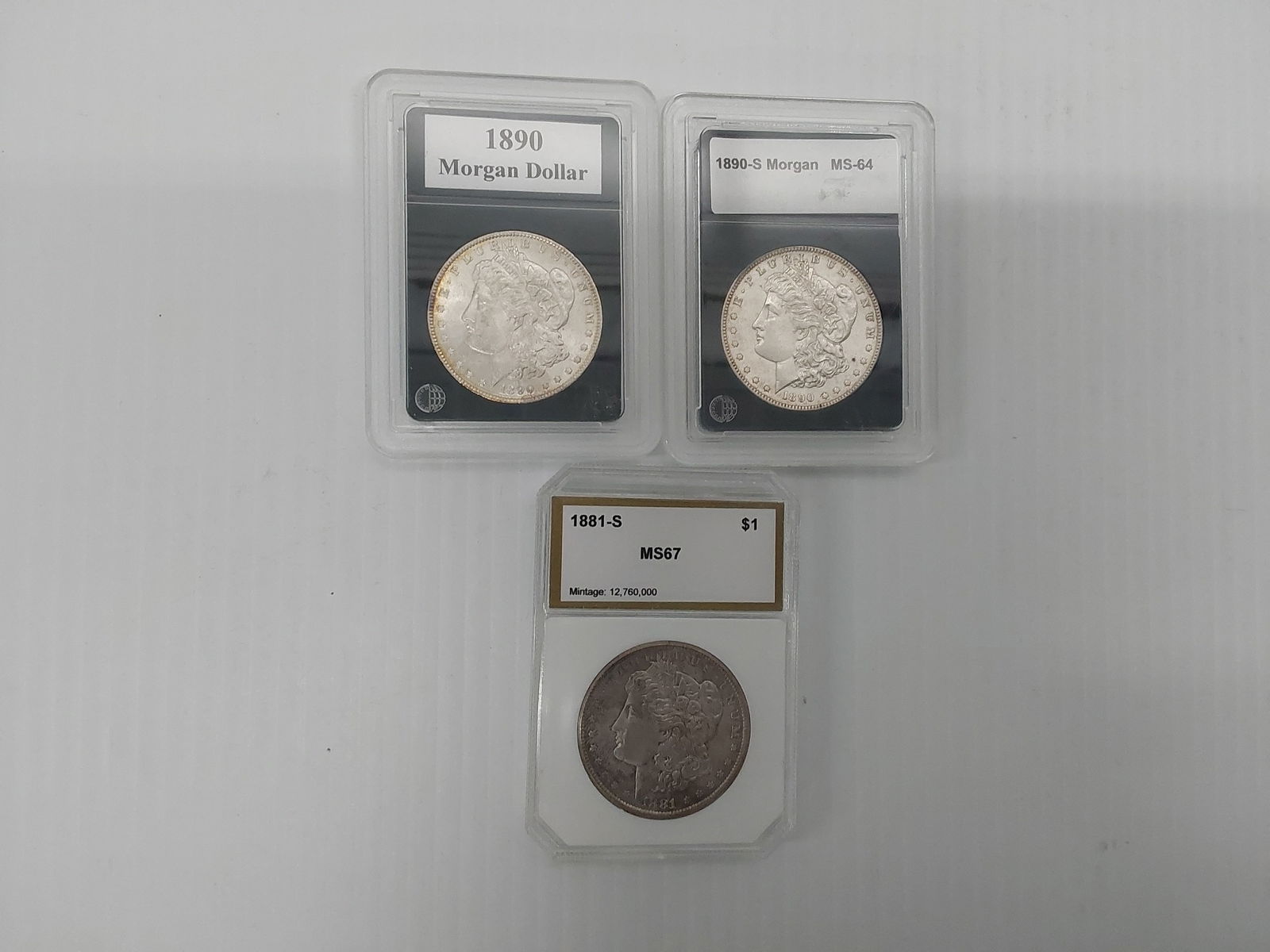 (3) Morgan silver dollars (1 of 2)