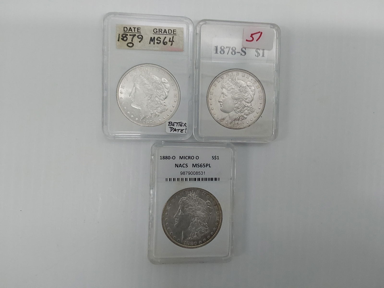 (3) Morgan silver dollars (1 of 2)