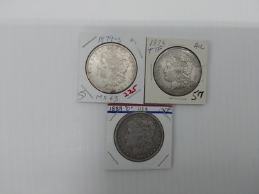 (3) Morgan silver dollars in holders