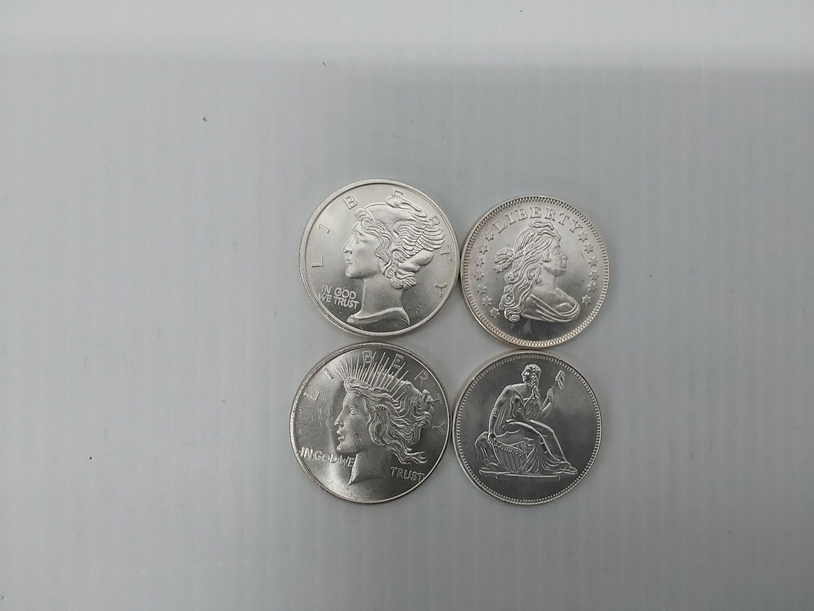 (4) 1 ozt .999 miscellaneous silver rounds (1 of 1)