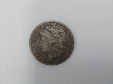 1892 CC Morgan silver dollar
