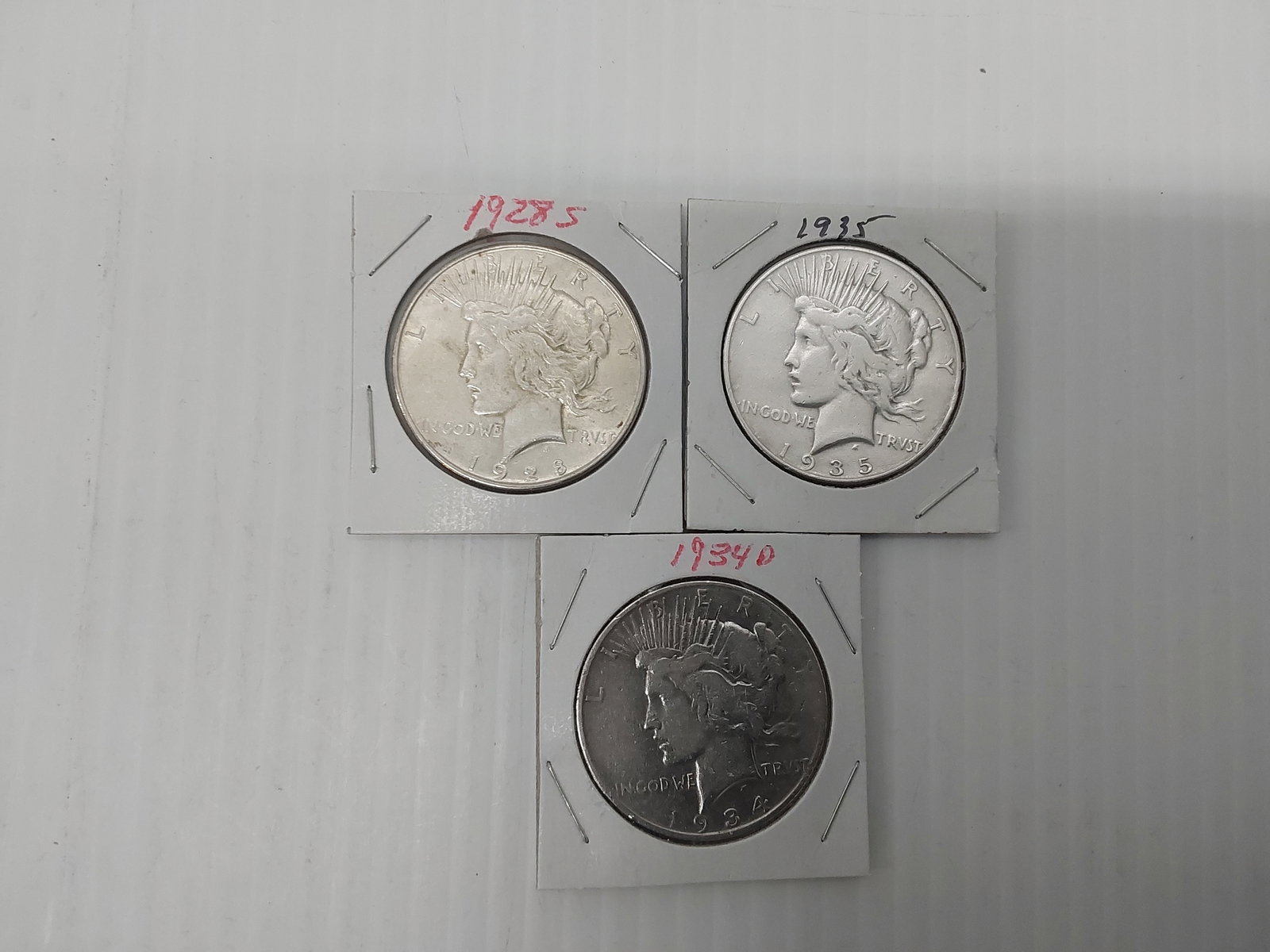 (3) Peace silver dollars (1 of 2)